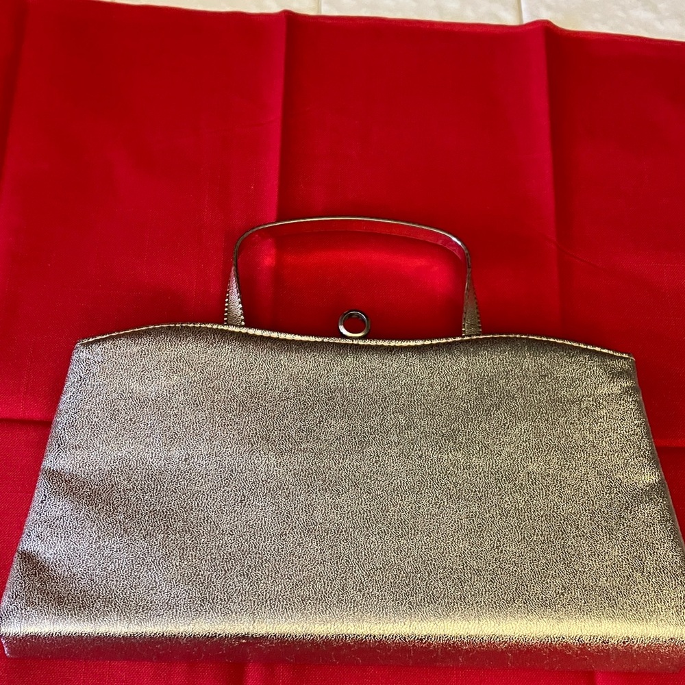 Vintage Elegant Gold Clutch with Hidden Handle.